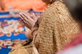 Beautiful Asian girl to pay respect and praying Buddhism worshiping Buddha statue with faith. Hands begging, put your hands togeth Royalty Free Stock Photo