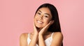 Beautiful Asian Girl Touching Face Smiling Posing On Pink Background Royalty Free Stock Photo