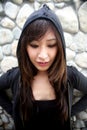 Beautiful Asian girl wearing a hood Royalty Free Stock Photo