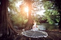 Beautiful Asian girl in a wedding dress showing happy moments