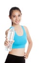 Beautiful Asian healthy girl with bottle of drinking water Royalty Free Stock Photo