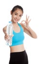 Beautiful Asian healthy girl with bottle of drinking water Royalty Free Stock Photo