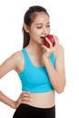 Beautiful Asian healthy girl eat red apple Royalty Free Stock Photo