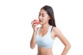 Beautiful Asian healthy girl eat red apple. Royalty Free Stock Photo