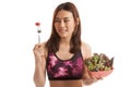 Beautiful Asian healthy girl enjoy eating salad. Royalty Free Stock Photo