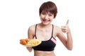 Beautiful Asian healthy girl with french fries and fired chicken Royalty Free Stock Photo