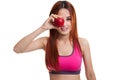 Beautiful Asian healthy girl with red apple. Royalty Free Stock Photo