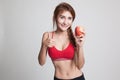 Beautiful Asian healthy girl thumbs up with apple. Royalty Free Stock Photo