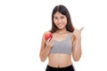 Beautiful Asian healthy girl thumbs up with apple. Royalty Free Stock Photo