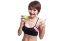 Beautiful Asian healthy girl thumbs up with apple. Royalty Free Stock Photo