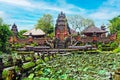 Beautiful asian landscape, lotus flower pond water garden,  ancient red hindu temple, blue sky - Ubud, Pura Taman Saraswati Water Royalty Free Stock Photo