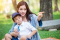 Beautiful asian mother playing with her lovely son Royalty Free Stock Photo