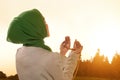 Beautiful asian muslim woman praying with prayer beads Royalty Free Stock Photo