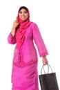 Beautiful asian muslimah woman with black wicker tote bags.Isolated Royalty Free Stock Photo