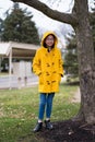 Asian Teen Girl In Yelow Coat Royalty Free Stock Photo