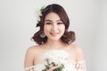 Beautiful asian woman bride on grey background. Closeup portrait Royalty Free Stock Photo