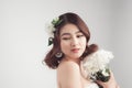 Beautiful asian woman bride on grey background. Closeup portrait Royalty Free Stock Photo