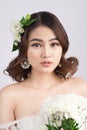 Beautiful asian woman bride on grey background. Closeup portrait Royalty Free Stock Photo