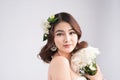 Beautiful asian woman bride on grey background. Closeup portrait Royalty Free Stock Photo