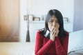 Beautiful asian woman coughing with sore throat,Female suffering with cough a lot in bedroom