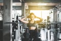 Beautiful asian woman doing situp or crunches in gym,Female exercise muscular her stomach,Happy and smiling Royalty Free Stock Photo