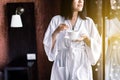 Beautiful asian woman drinking hot coffee at bedroom after wake up in the morning,Relax time,Happy and smiling,Healthy and lifesty Royalty Free Stock Photo