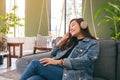 A beautiful asian woman enjoy listening to music with headphone Royalty Free Stock Photo