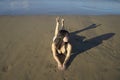 Beautiful Asian woman enjoying sand and sea - young happy and attractive Korean girl in bikini having fun at tropical beach during Royalty Free Stock Photo