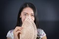 Beautiful Asian woman with a hand fan Royalty Free Stock Photo