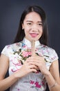 Beautiful Asian woman with a hand fan Royalty Free Stock Photo