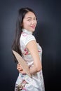 Beautiful Asian woman with a hand fan Royalty Free Stock Photo