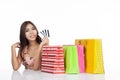 Beautiful Asian woman happy with credit cards and shopping bags Royalty Free Stock Photo
