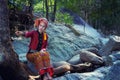 Beautiful Asian woman with karen traditional dress explore in forest in local country Thailand, Asia Royalty Free Stock Photo