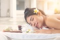 Beautiful asian woman lying with happy mood on vacation day.Wellness body care and spa aromatheraphy concept