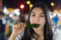 Beautiful asian woman in the night street market Royalty Free Stock Photo