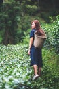 A beautiful woman picking tea leaf in a highland tea plantation Royalty Free Stock Photo