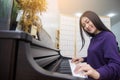 Beautiful asian woman playing piano. selective focus on face Royalty Free Stock Photo