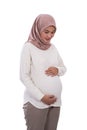 Beautiful asian woman pregnant wearing hijab