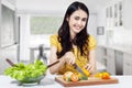 Beautiful asian woman prepare salad