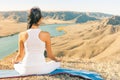 Beautiful asian woman relaxing and meditating outdoor at mountai Royalty Free Stock Photo