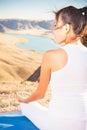 Beautiful asian woman relaxing and meditating outdoor at mountai Royalty Free Stock Photo