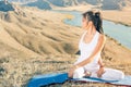 Beautiful asian woman relaxing and meditating outdoor at mountai Royalty Free Stock Photo