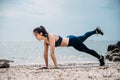 An beautiful Asian woman running and drinking some water during morning Royalty Free Stock Photo