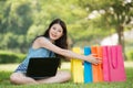 Beautiful asian woman shopping online holding gift Royalty Free Stock Photo