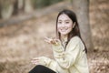 Beautiful Asian woman Smiling happy girl and wearing warm clothe Royalty Free Stock Photo