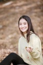 Beautiful Asian woman Smiling happy girl and wearing warm clothe Royalty Free Stock Photo