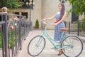 Beautiful asian woman travel at asia by city vintage bicycle Royalty Free Stock Photo