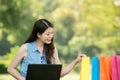 Beautiful asian woman using computer shopping online Royalty Free Stock Photo