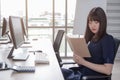 Beautiful staff are happy at the office desk