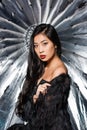 beautiful asian woman wearing ostrich feathers coat and looking Royalty Free Stock Photo